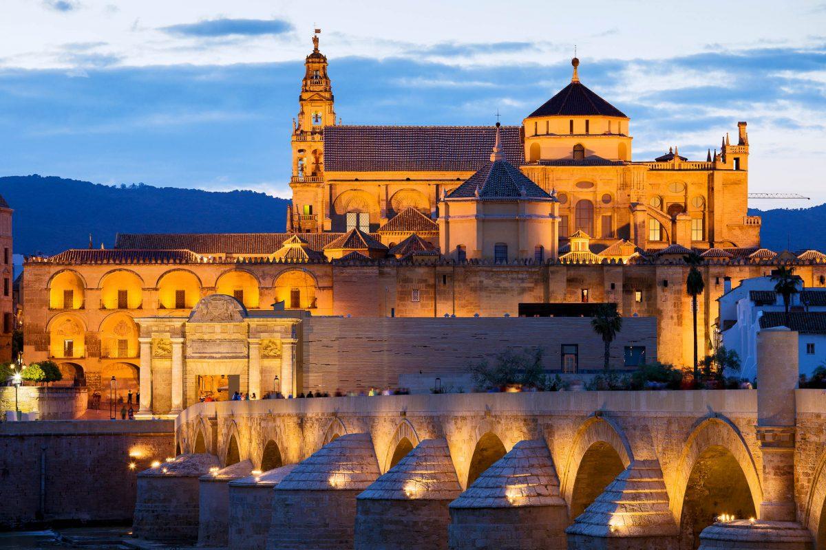 The Mezquita mosque in Cordoba impresses with its stunning mix of styles from the south, east and west, and the cathedral that rises from its center, Spain - © Artur Bogacki / Shutterstock